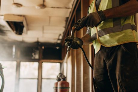 a-person-working-fire-damage-prevention