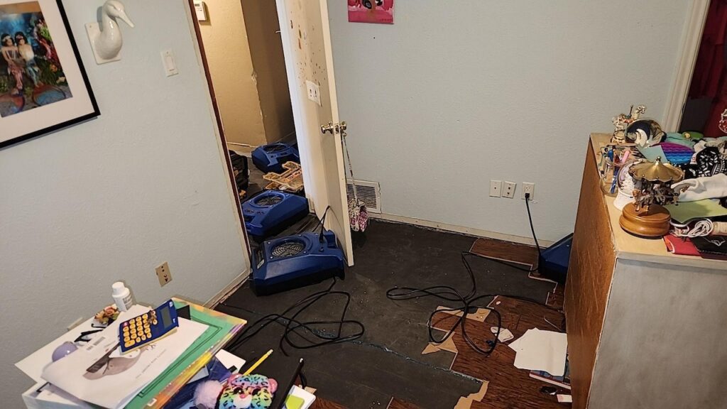 High-powered air movers in contaminated area.