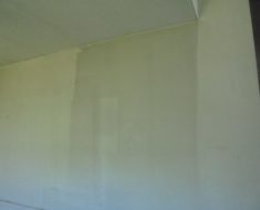 Soot being removed from the wall