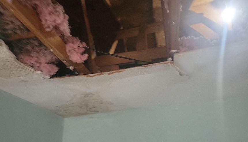 A collapsed ceiling from an HVAC pan leak.