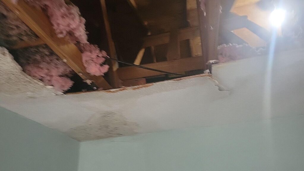 A collapsed ceiling from an HVAC pan leak.