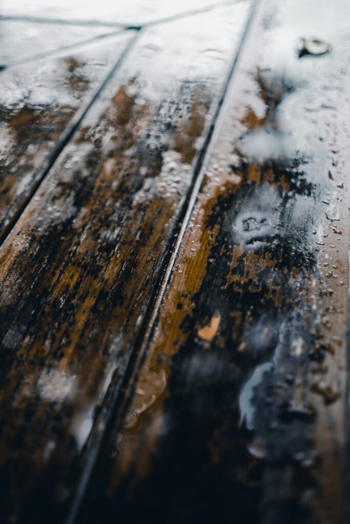 Water on wood flooring could be seeping through underneath the floor.