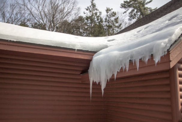 Dealing with Ice Dams and Water Damage in Maine (What to Do)