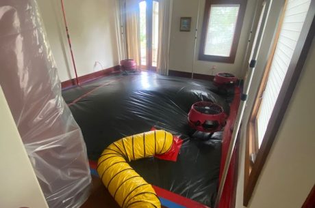 A home under water damage restoration after flooding