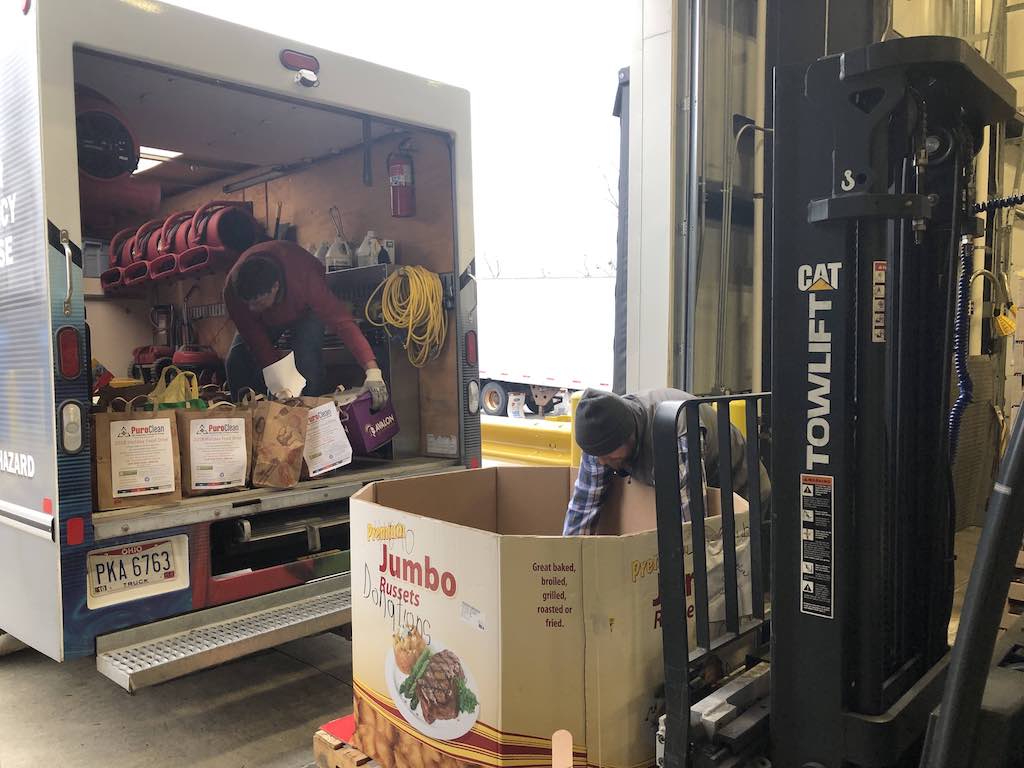 Loading food at the food bank in 2019