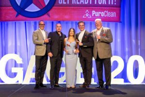 PuroClean of bloomfield team receiving Franchise of the Year 2024 award