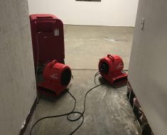 fans set up to dry water damage project