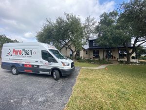 PuroClean van in front of home during remediation and reconstruction job.