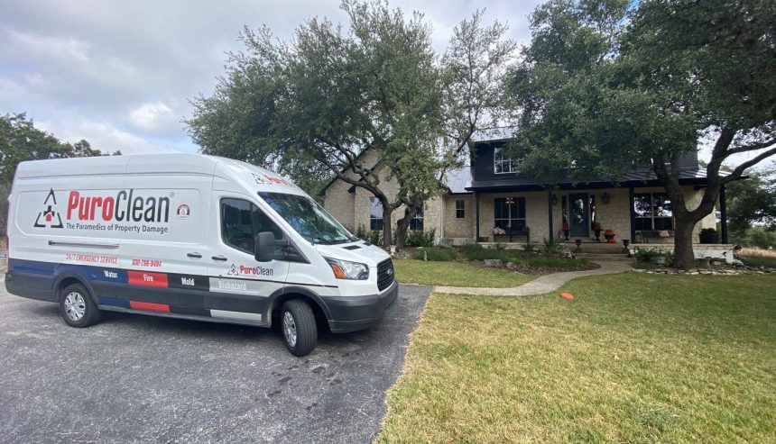 PuroClean van in front of home during remediation and reconstruction job.