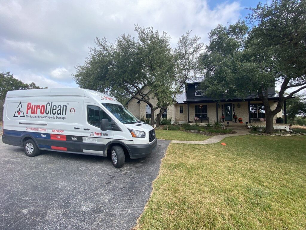 PuroClean van in front of home during remediation and reconstruction job.