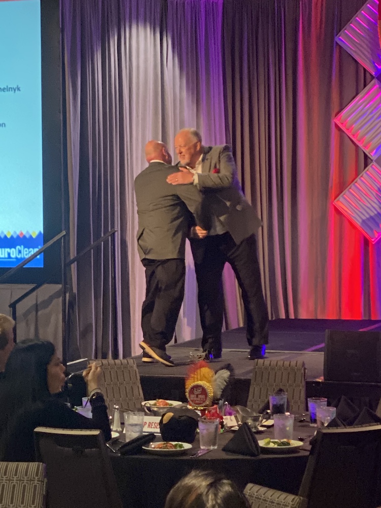 Chris Schatz accepts his awards