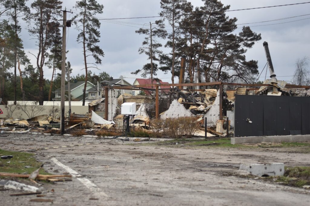Destroyed houses along the road