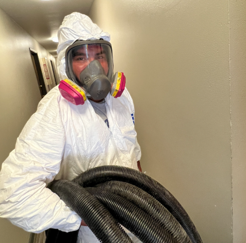 Sewage contamination cleanup Bradenton professional technician assessing damage