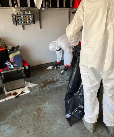 certified after death cleaning service technicians in protective gear at a Bradenton home