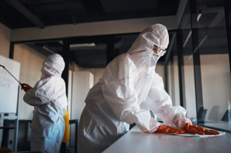 Professional blood cleanup services Bradenton FL technician in full protective gear