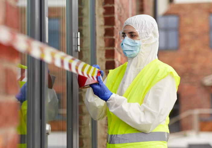 Professional biohazard cleaning services team communicating compassionately with property owner in Bradenton FL