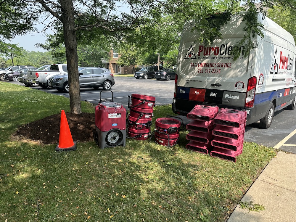 Our truck parked out front an apartment complex with all of our equipment at the ready