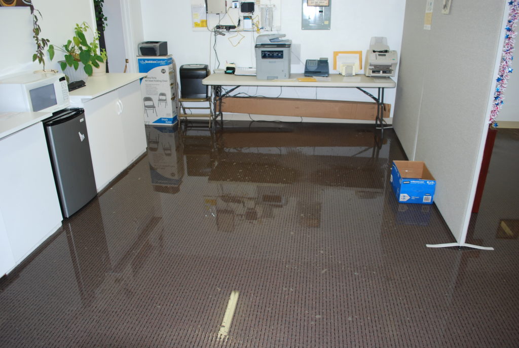 holiday closure water damage plan for Burlington businesses