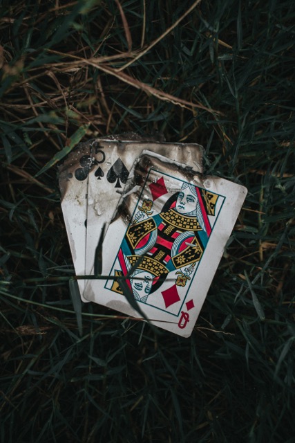 Burned playing cards after house fire damage in North Metro Atlanta Georgia