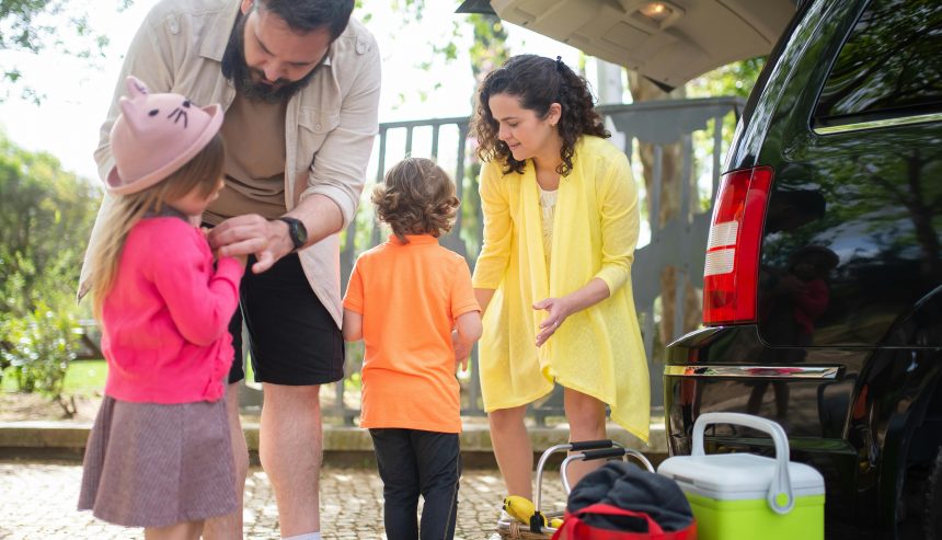 Holiday home safety tips Atlanta family packing car before traveling