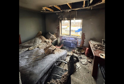 Professional emergency fire damage cleanup services restoring residential property after a fire.