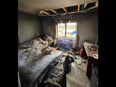 Professional emergency fire damage cleanup services restoring residential property after a fire.
