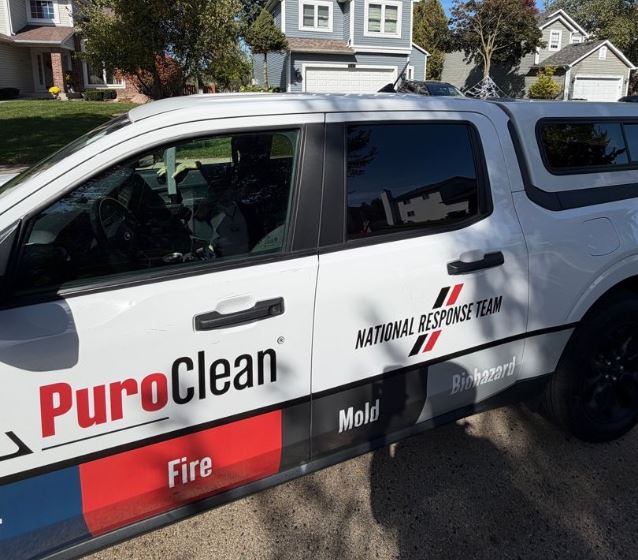 White PuroClean National Response Team truck advertises fire, mold, and biohazard cleanup services