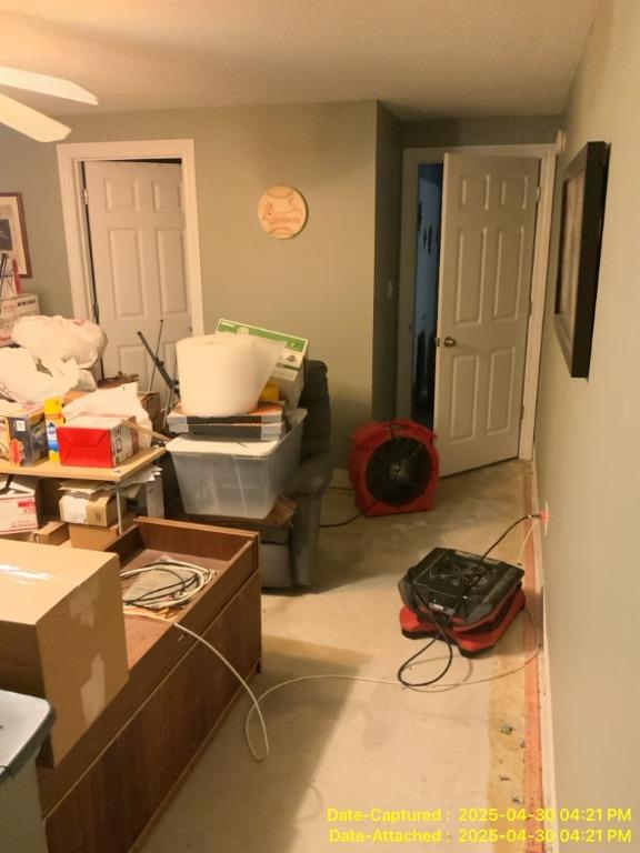 Drying equipment and air movers placed in a basement during sump pump failure cleanup and water damage restoration in Edwardsville, IL.