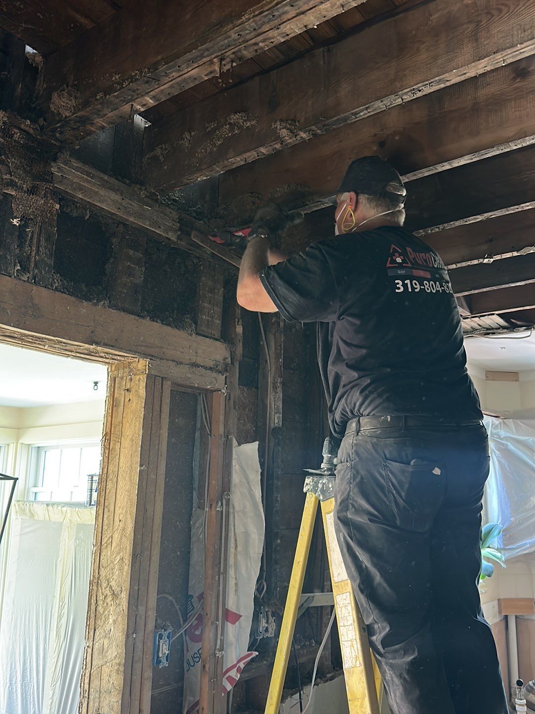 Owner, Steve Feldmann, working at the demolition jobsite
