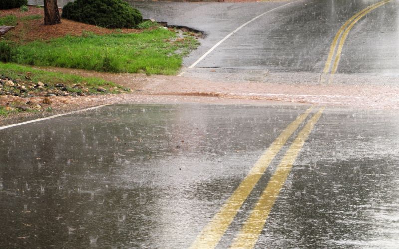 Heavy rain falling on the road - Sump pump