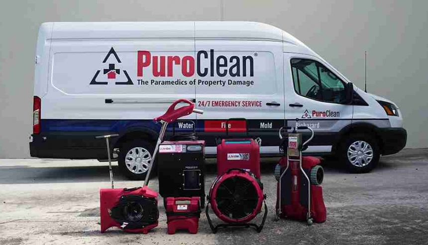 Restoration team arriving at a property with emergency equipment