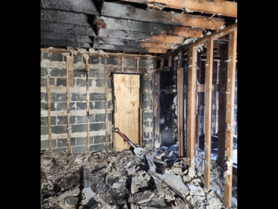Professional emergency fire damage cleanup services restoring residential property after a fire.