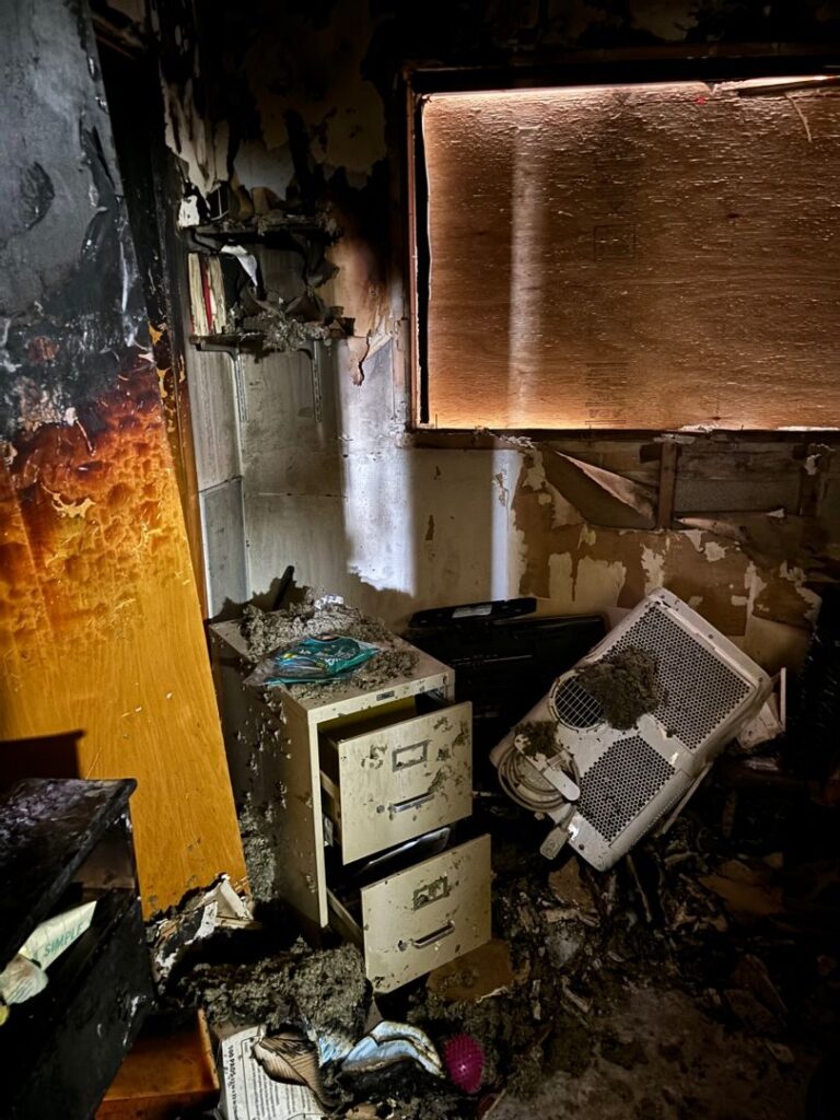 Fire-damaged residential interior undergoing restoration in Downtown Chicago, showing structural damage and debris removal as part of PuroClean of Downtown Chicago’s fire resilience rebuilding process