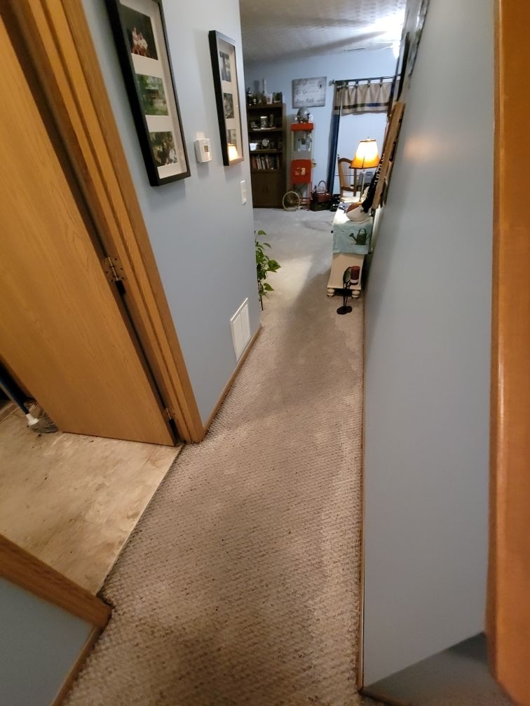 The water damage affected the hallway and utility room.