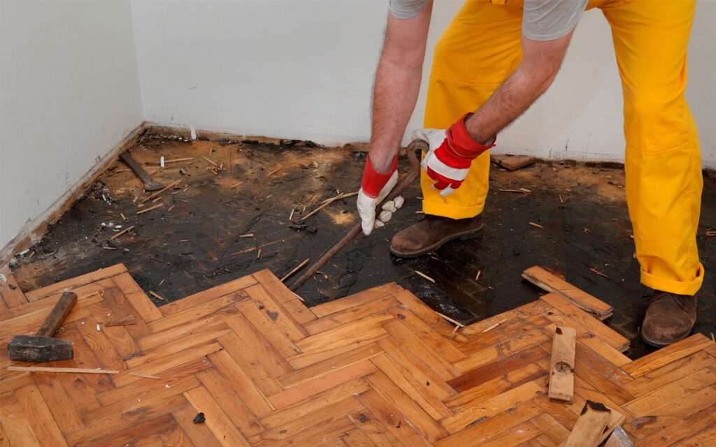 Warped subfloor revealed during inspection