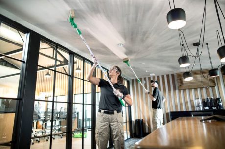 Commercial interior undergoing professional cleaning after damage