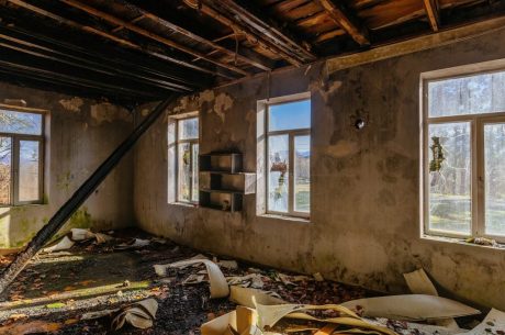 Fire damaged interior after flames have been extinguished