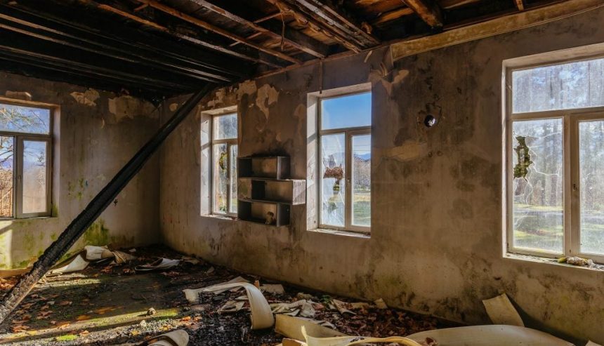 Fire damaged interior after flames have been extinguished