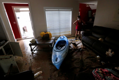 residential flood damage inside home Covington Louisiana after heavy rain