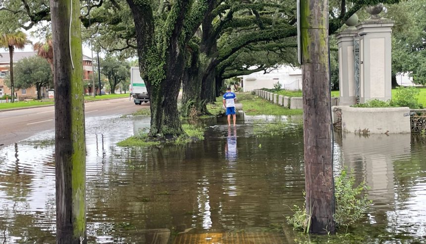 Flooded residential neighborhood in Covington LA with contaminated stormwater following a hurricane or tropical storm event requiring professional flood clean up