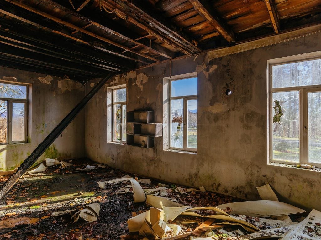 Fire damaged interior after flames have been extinguished
