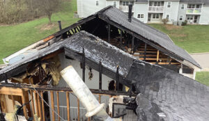 Fire damage restoration assessment on an older historic wood-frame home in Mandeville LA near Lake Pontchartrain requiring specialized restoration approach