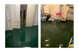 Flooded concrete floor inside a garage or commercial utility room