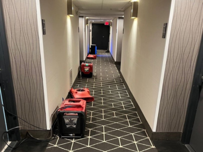 PuroClean of Park Cities/North Dallas team restoring a commercial building after water damage in Dallas, TX
