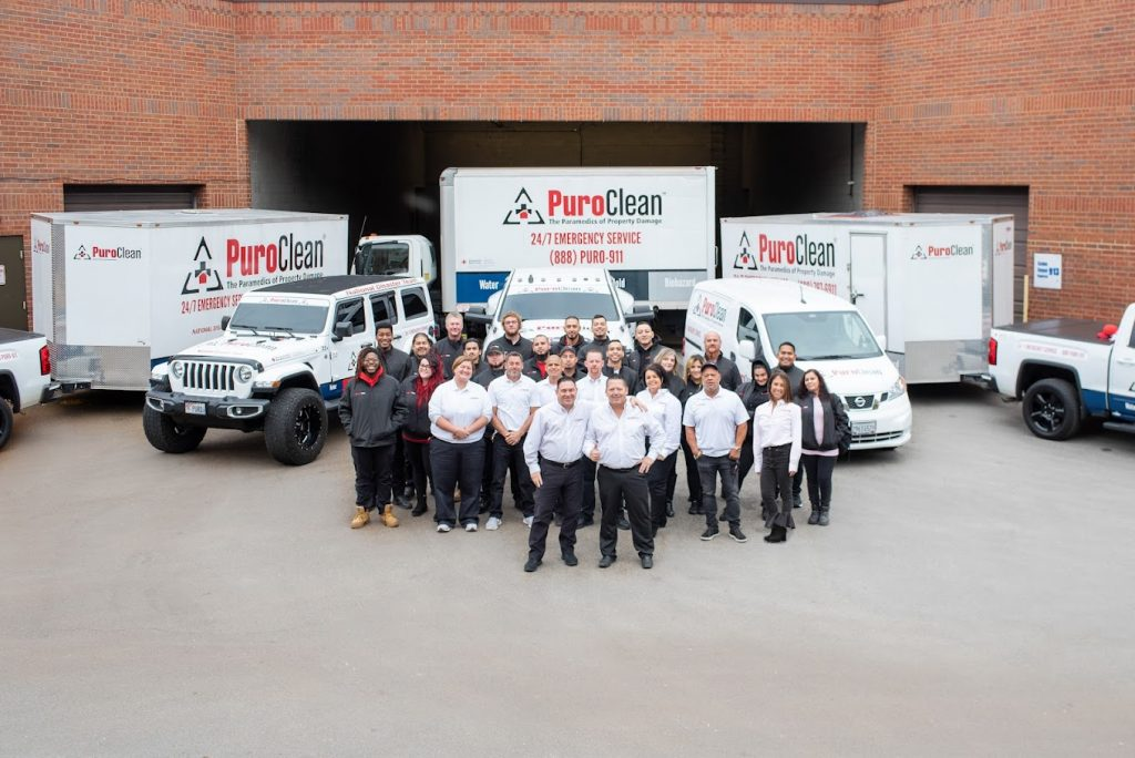 The PuroClean of Park Cities/North Dallas team, specialists in commercial water damage restoration, standing together and ready to assist local businesses.