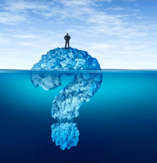A person stands on an iceberg, which forms a question mark shape beneath the deep blue
