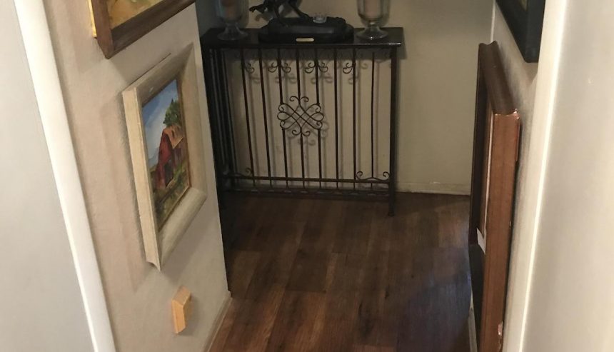The entry hallway was affected by water damage.