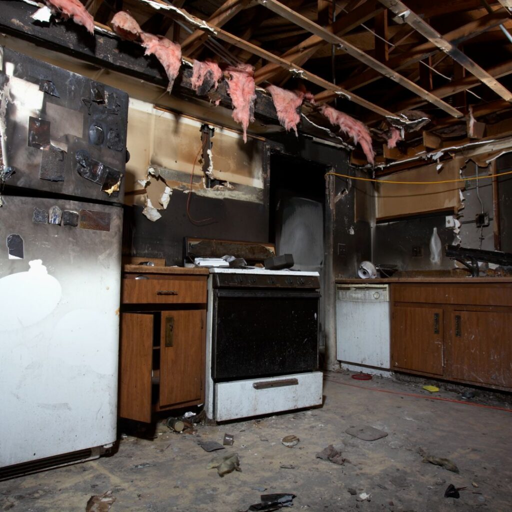 damaged kitchen from a house fire - The Comprehensive Guide to Fire Damage Restoration: 7 Stages of Fire Restoration
