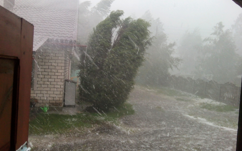 rainstorm striking a house - disaster recovery plan