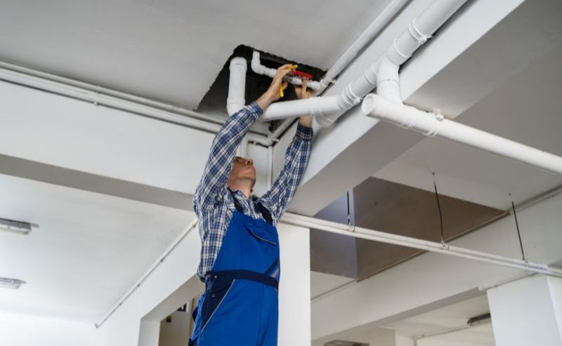 puroclean worker fixing pipes - disaster recovery plan